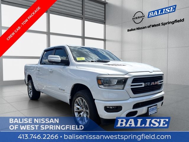 2023 RAM 1500 Laramie in Bright White Clearcoat — front three-quarter view
