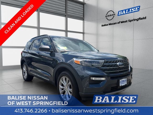 2023 Ford Explorer XLT in Stone Blue Metallic — front three-quarter view
