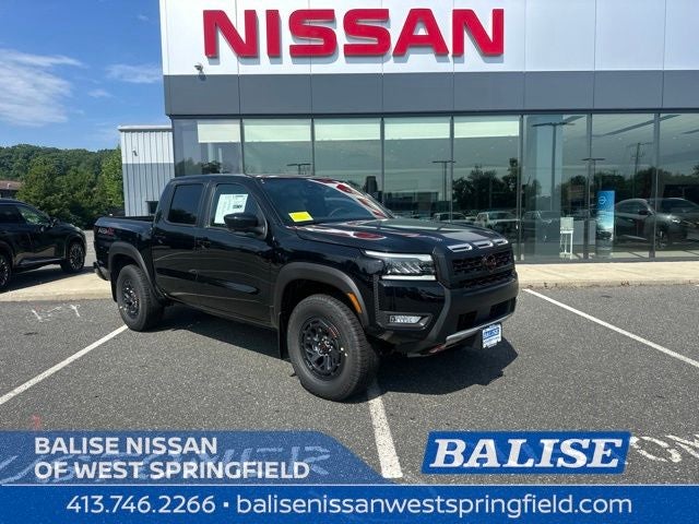 2026 Nissan Frontier PRO-4X in Super Black — front three-quarter view