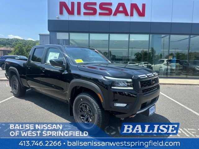 2026 Nissan Frontier PRO-4X in Super Black — front three-quarter view