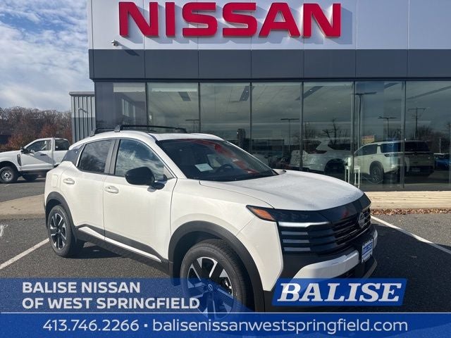 2026 Nissan Kicks SV in Aspen White Tricoat — front three-quarter view