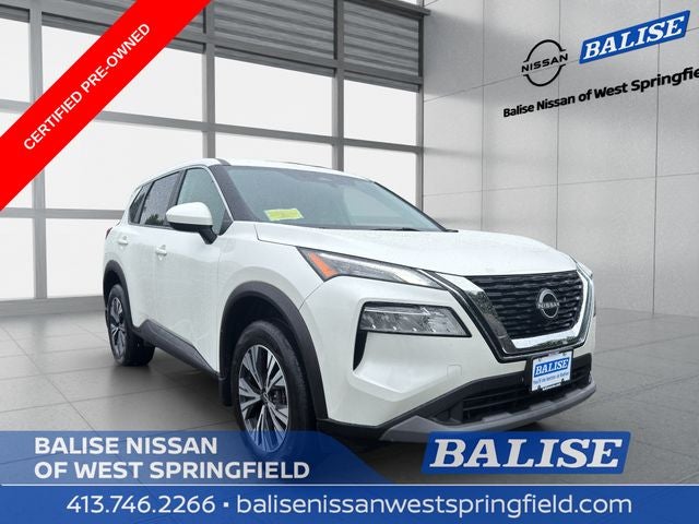 2023 Nissan Rogue SV in Pearl White Tricoat — front three-quarter view